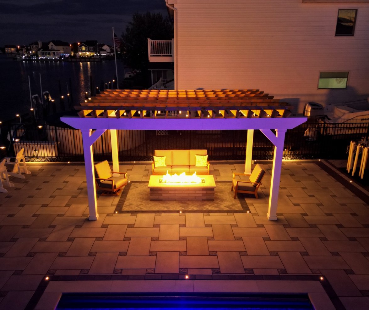 Fire Pit Installation in NJ Professional Fire Pit Installation in NJ with a custom stone fire pit and seating area